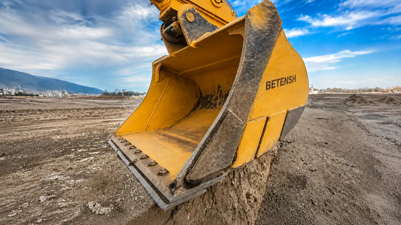 Excavator bucket on an earthwork site